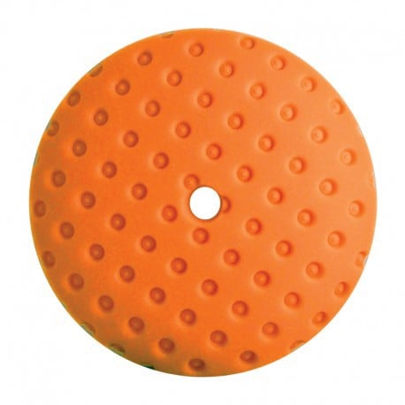 Orange polishing pad with a white center on a white background