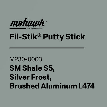 Product label for Mohawk Fil-Stik Putty Stick with color specifications on a gray background