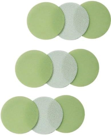 Set of green sanding discs on a white background