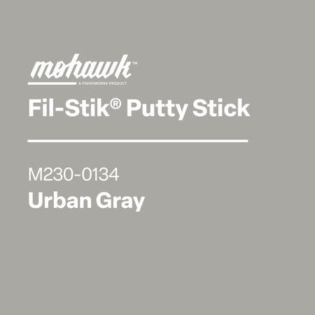 Product packaging for Mohawk Fil-Stik Putty Stick in Urban Gray on a gray background
