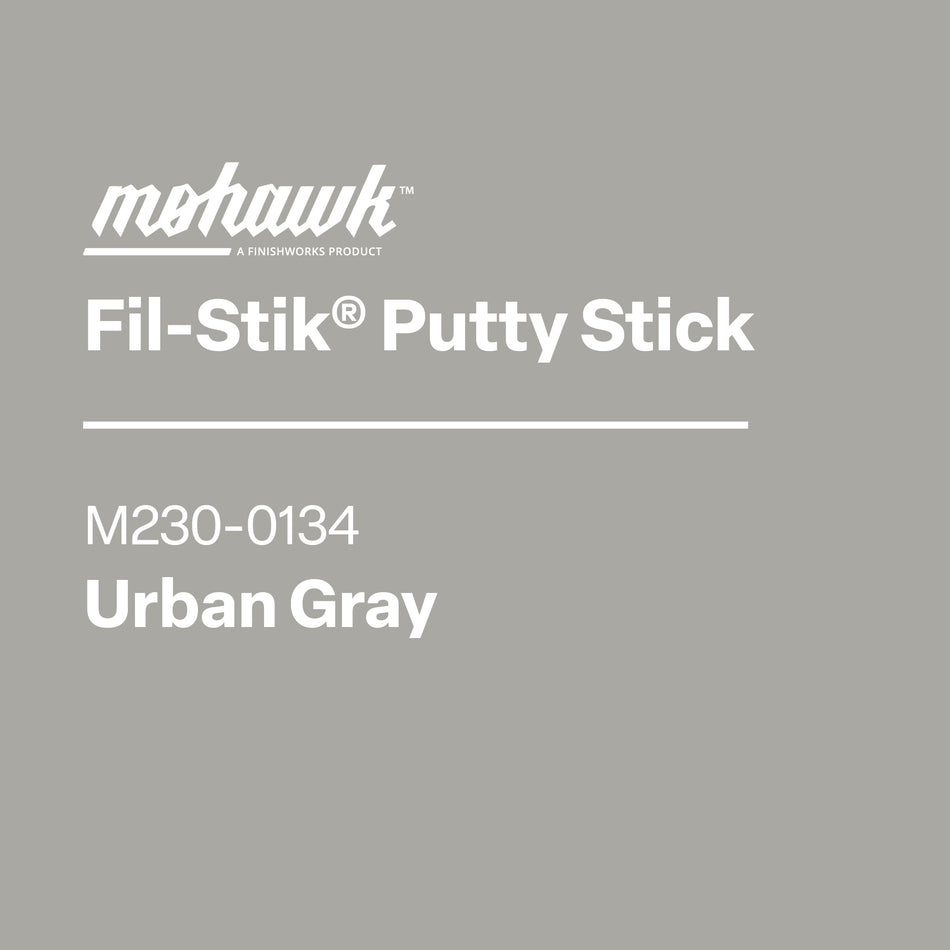 Product packaging for Mohawk Fil-Stik Putty Stick in Urban Gray on a gray background