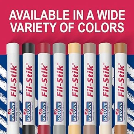 Fil-Stik markers in various colors with a red and blue striped background