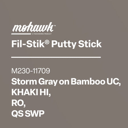 Product label for Mohawk Fil-Stik Putty Stick with color swatches on a gray background