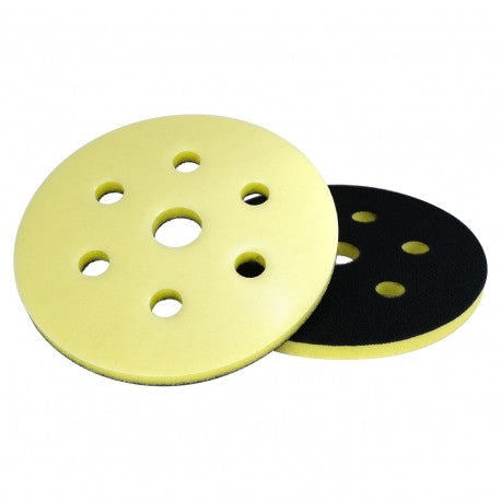 Two sanding discs, one yellow and one black, on a white background