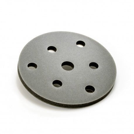 Sanding disc with multiple holes on a white background
