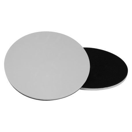 Two round sanding discs, one white and one black, on a white background.
