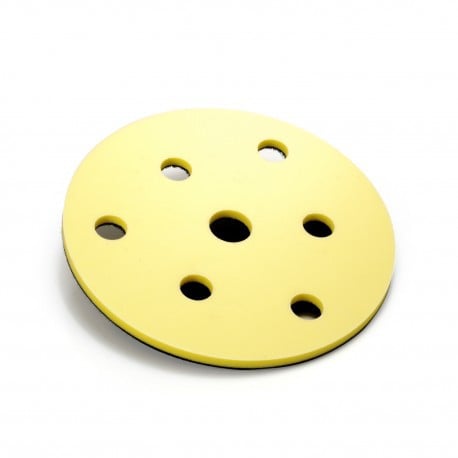 Yellow sanding disc with multiple holes on a white background