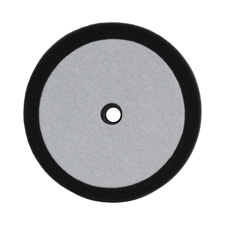 A 9-inch black foam buffing/polishing pad with a hole in the center for attachment.