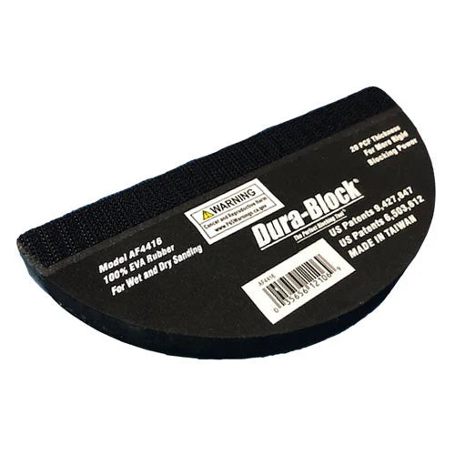 A black Dura-Disk Hook & Loop sanding block with product information and branding on the label.