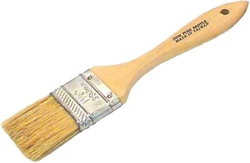 Paint brush with wooden handle and metal ferrule on a white background
