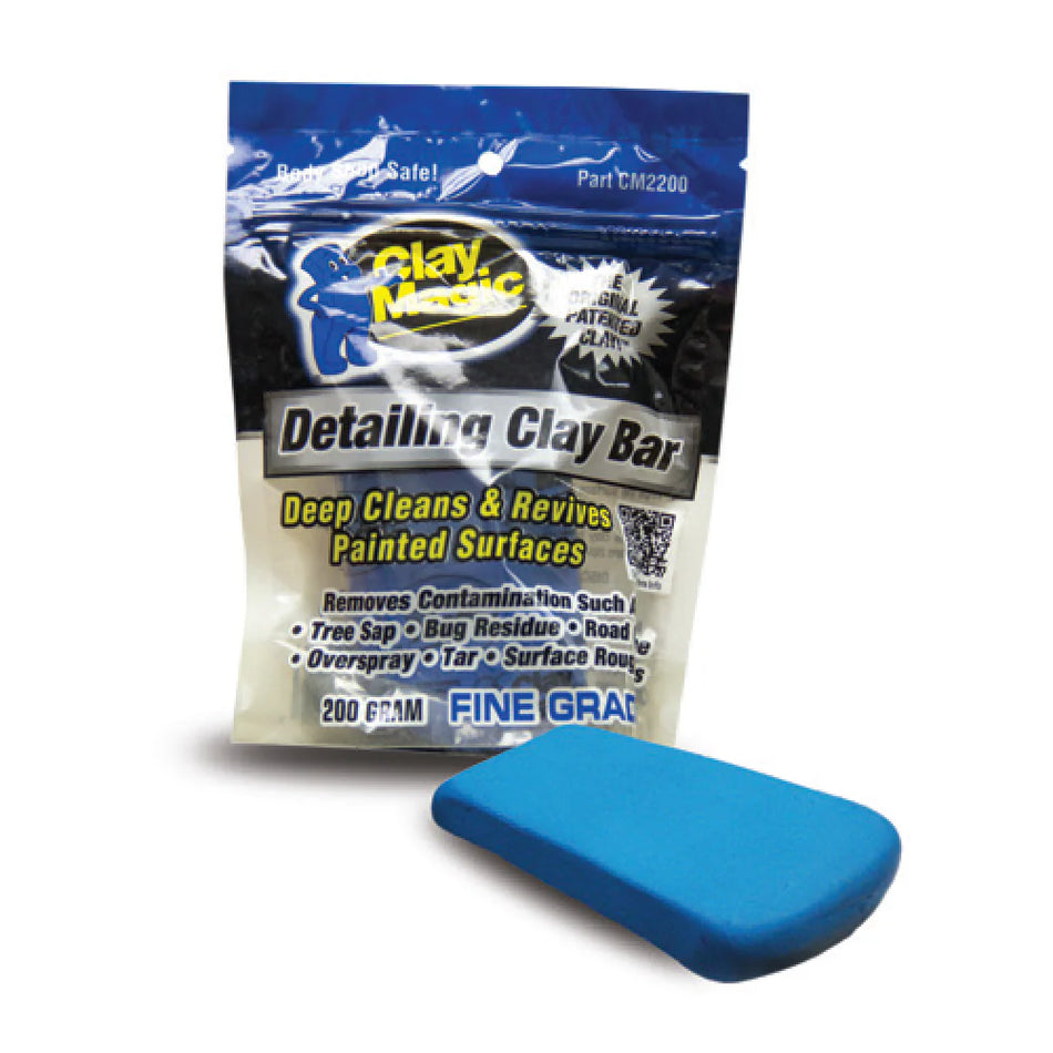 A package of AutoMagic Detailing Clay Bar in blue color, with the product visible in front of the package.