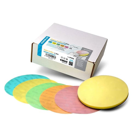Colorful sanding discs with a box on a white background