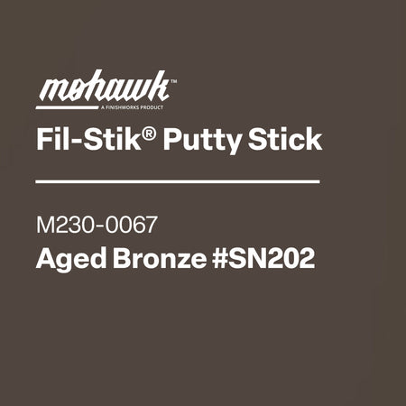 Mohawk Fil-Stik Putty Stick packaging with product details on a brown background