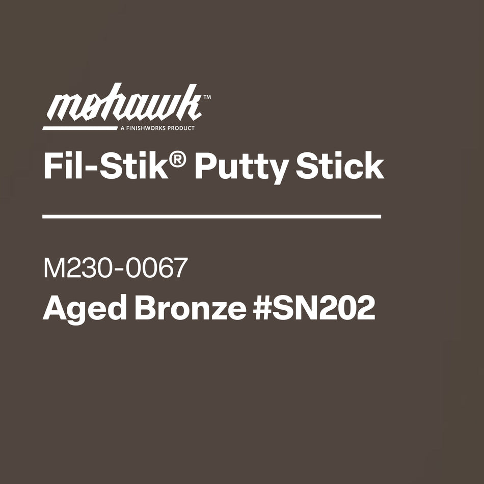 Mohawk Fil-Stik Putty Stick packaging with product details on a brown background