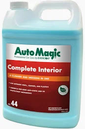 A blue plastic bottle of Auto Magic Complete Interior car interior cleaner.